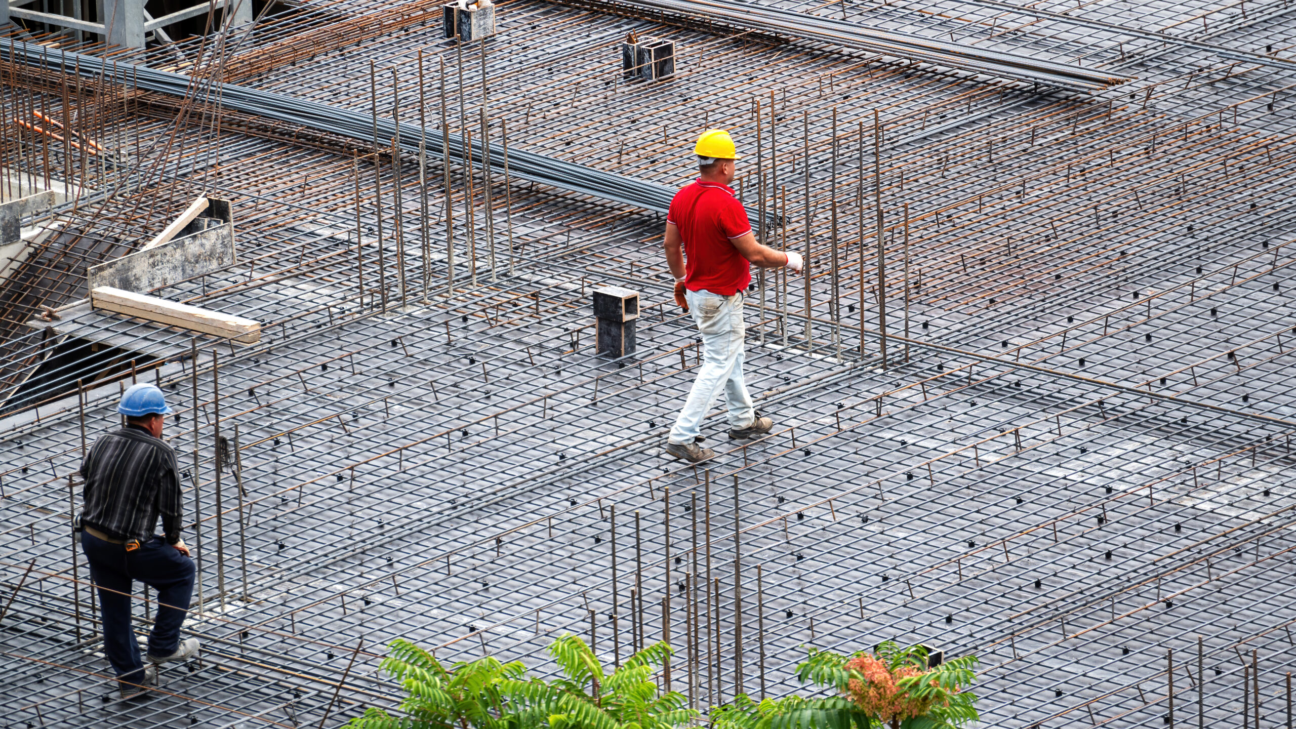 construction building workers working site cloudy day scaled